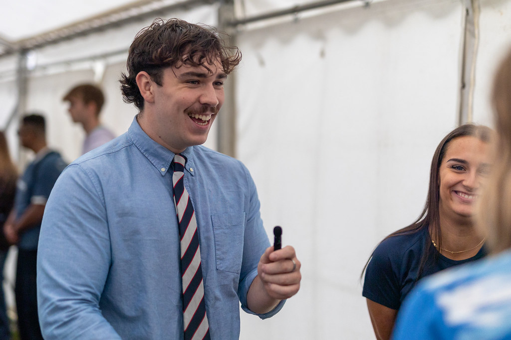 Student speaking to a group about campaigns