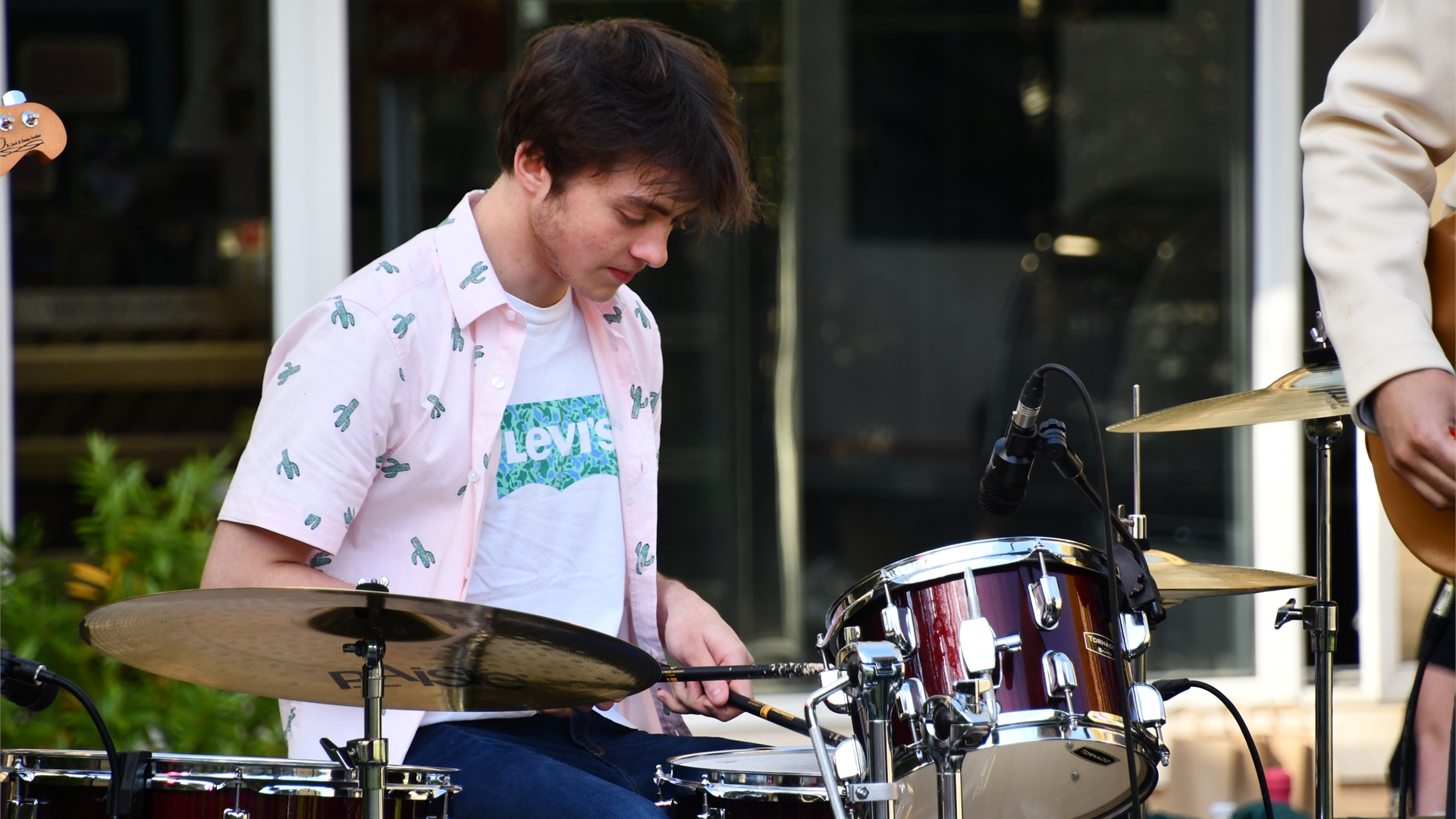 Person playing the drums
